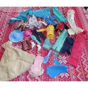 Lot of various Barbie clothes and shoes